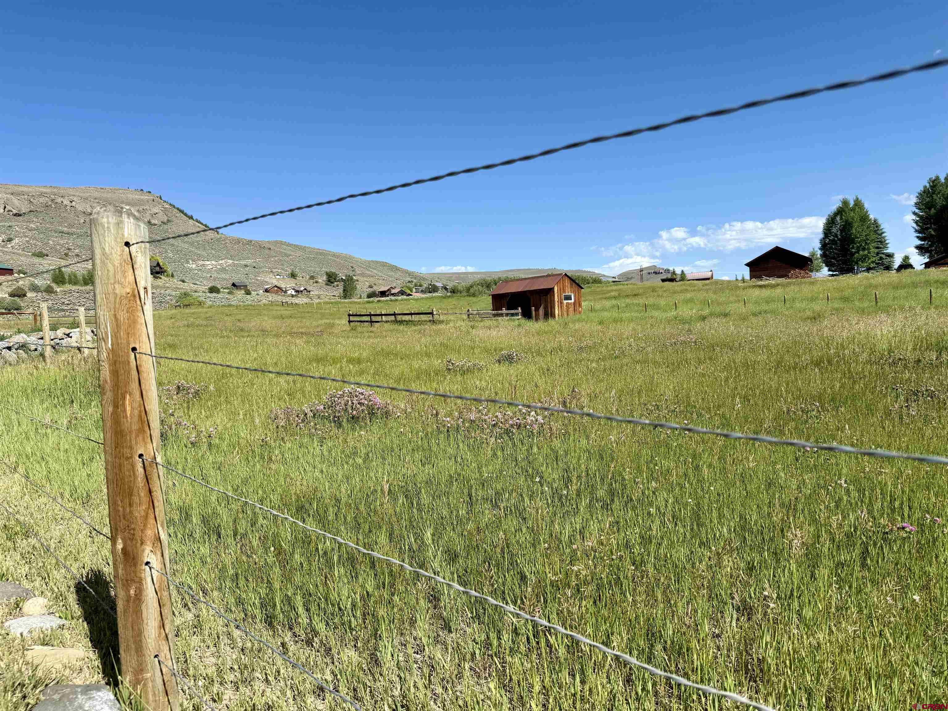 577 Pashuta Drive Gunnison, CO 81230 - Photo 33 of 41 a view of a big room with an outdoor space and seating area