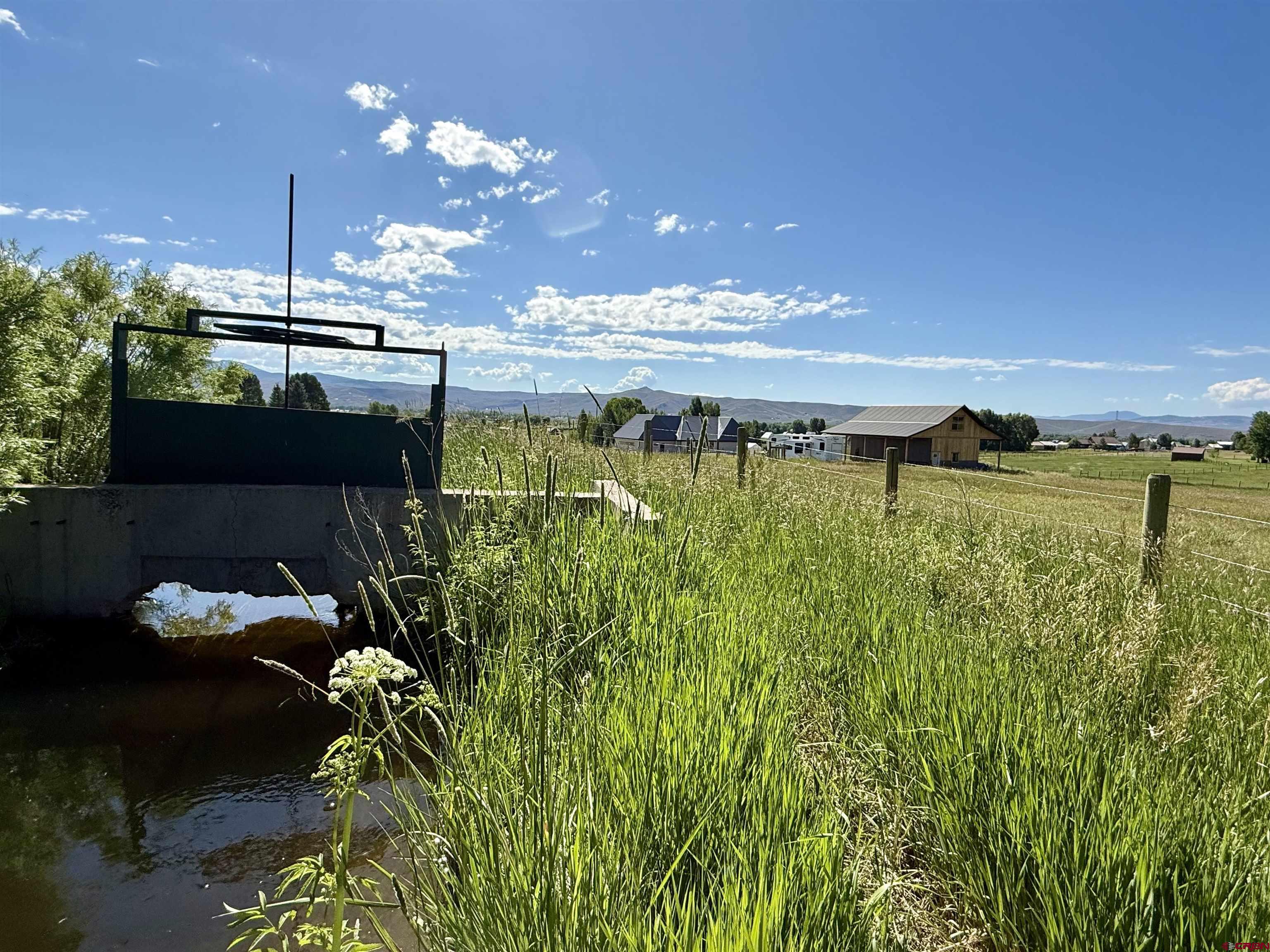 577 Pashuta Drive Gunnison, CO 81230 - Photo 36 of 41 a view of a swimming pool and an outdoor seating