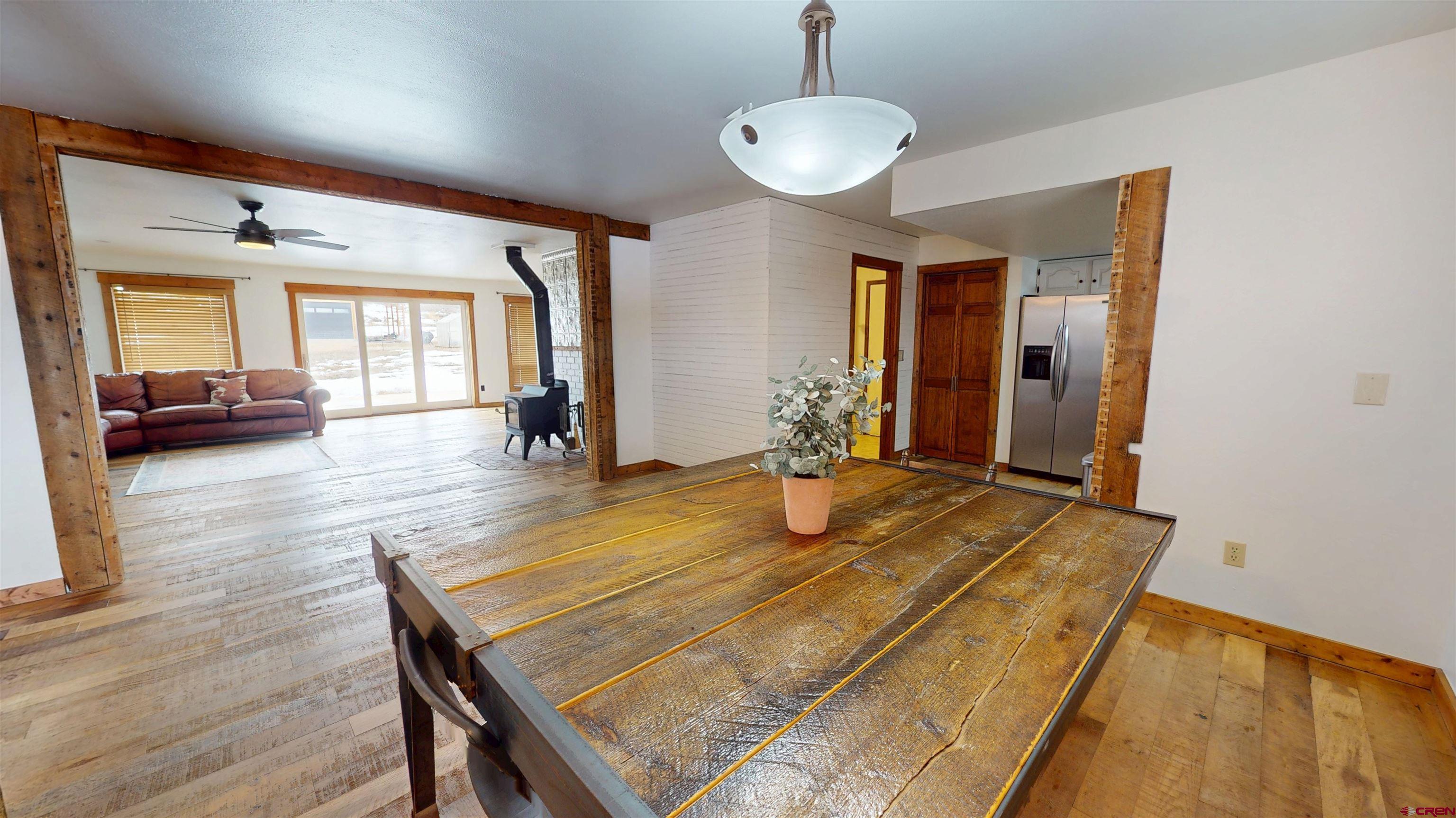 577 Pashuta Drive Gunnison, CO 81230 - Photo 7 of 41 a view of a dining room with furniture