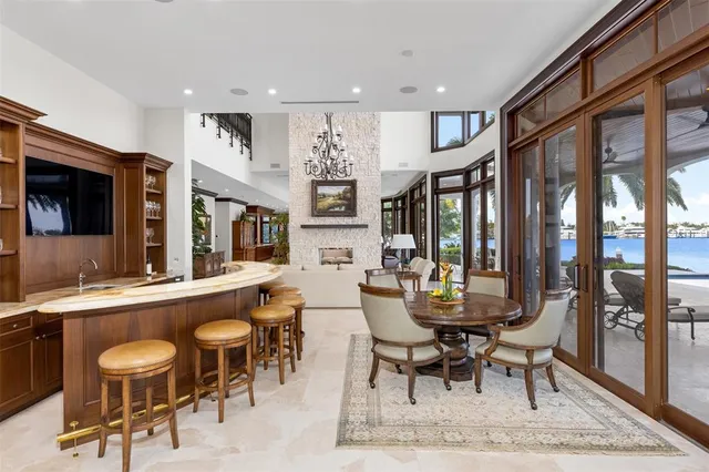 a spacious bedroom with a large bed and a large window