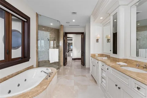 a view of a wooden bench in patio of a house