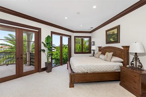 a view of swimming pool with outdoor seating and yard in back