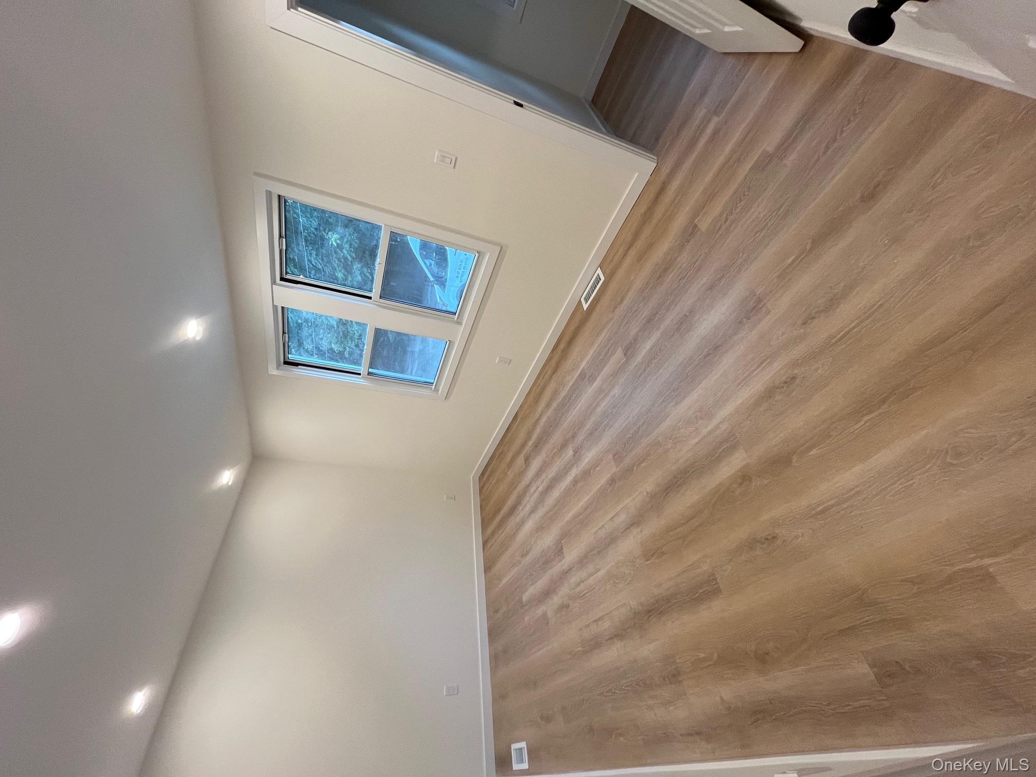 12 Backman Avenue, Unit 1 Ellenville, NY 12428 - Photo 2 of 9 a view of an empty room