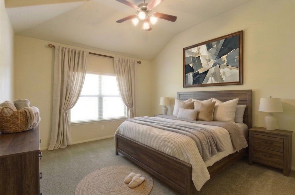 118 East Lasting Spring Circle Spring, TX 77389 - Photo 22 of 46 Virtually staged to perfection, this serene bedroom features a cozy bed, elegant artwork, and soft natural light filtering through tasteful drapery, creating an inviting and tranquil retreat.