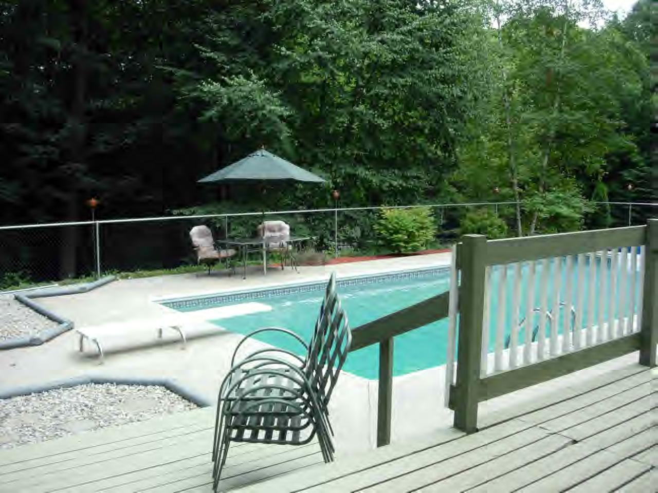 259 NW Road Westhampton, MA 01027 - Photo 4 of 10 a balcony with table and chairs