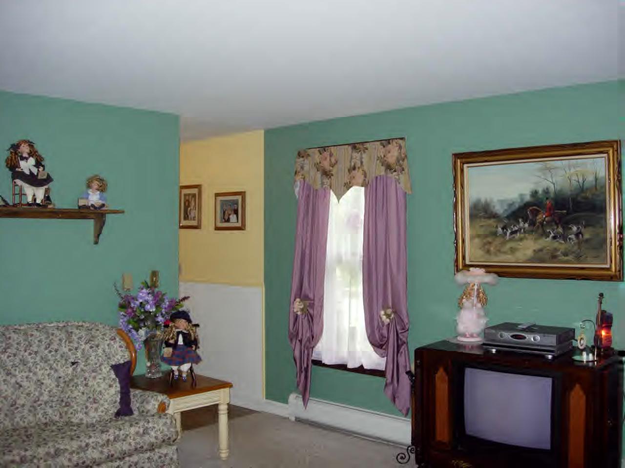 259 NW Road Westhampton, MA 01027 - Photo 8 of 10 a living room with furniture and a window