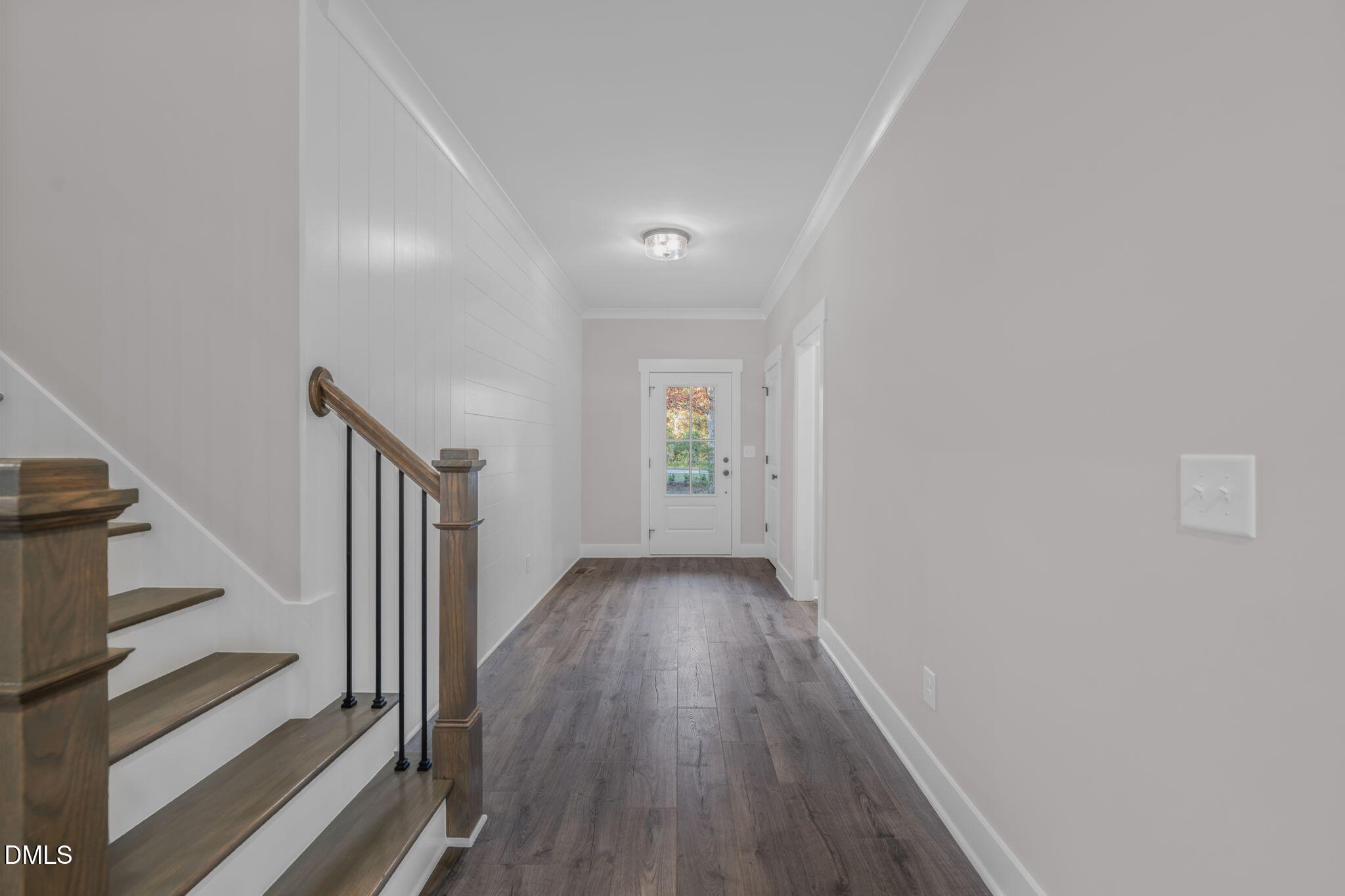 45 Beauview Way Zebulon, NC 27597 - Photo 2 of 40 a view of a hallway with wooden floor and entryway