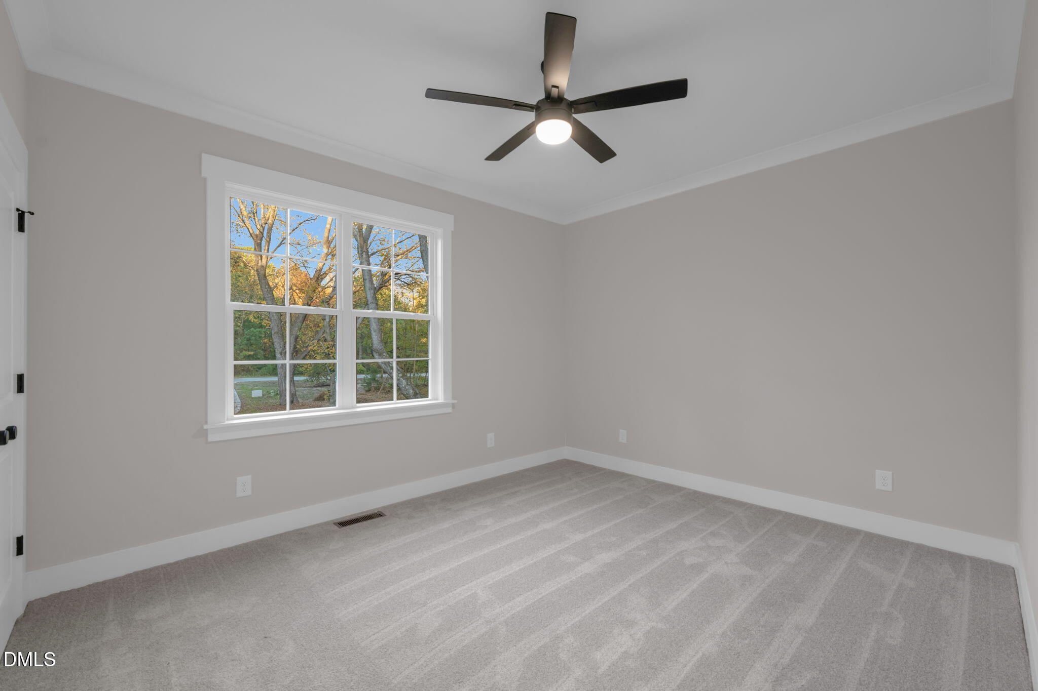 45 Beauview Way Zebulon, NC 27597 - Photo 25 of 40 an empty room with a window