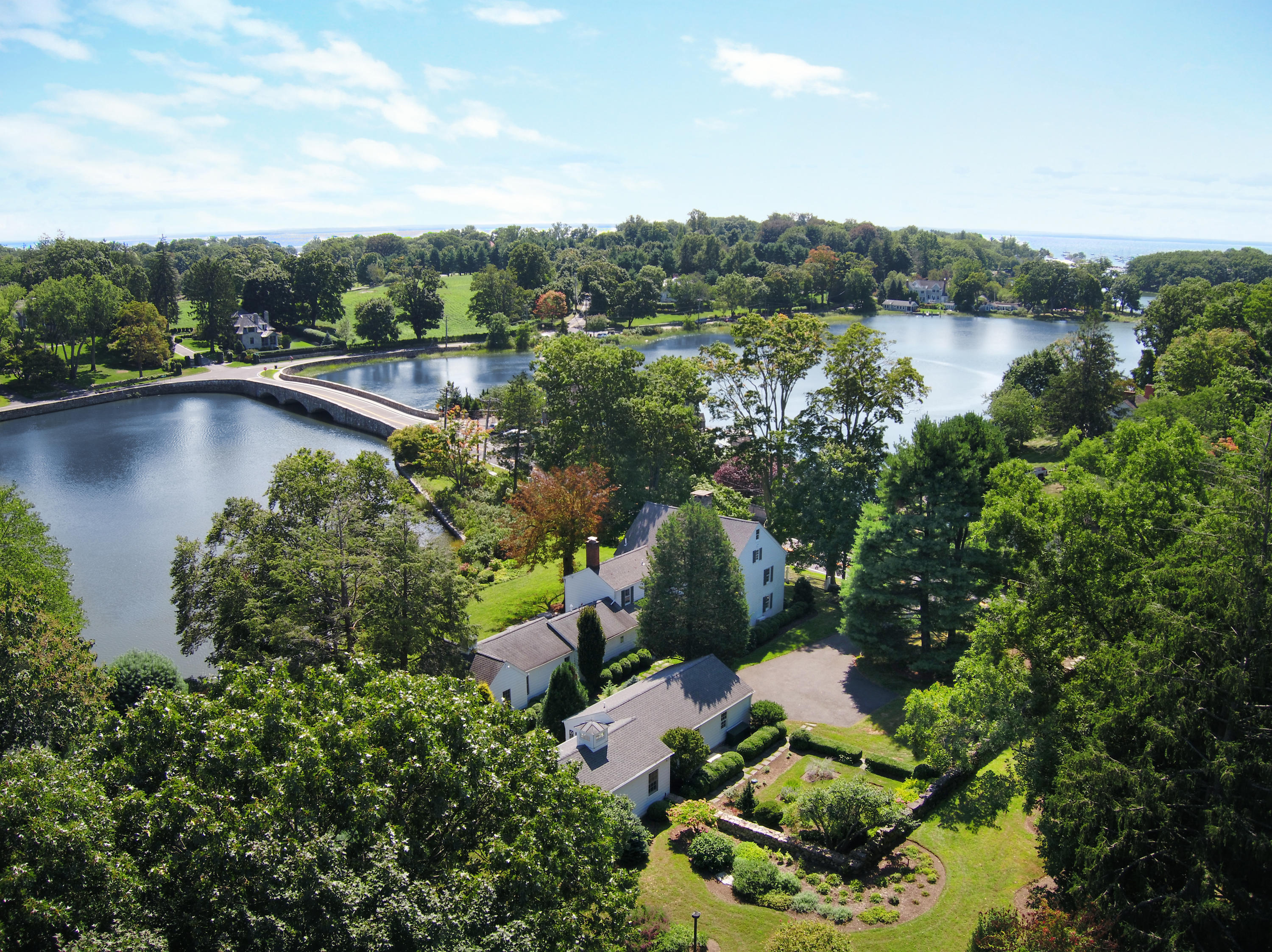 85 Rings End Road Darien, CT 06820 - Photo 1 of 39 a view of a lake with a city