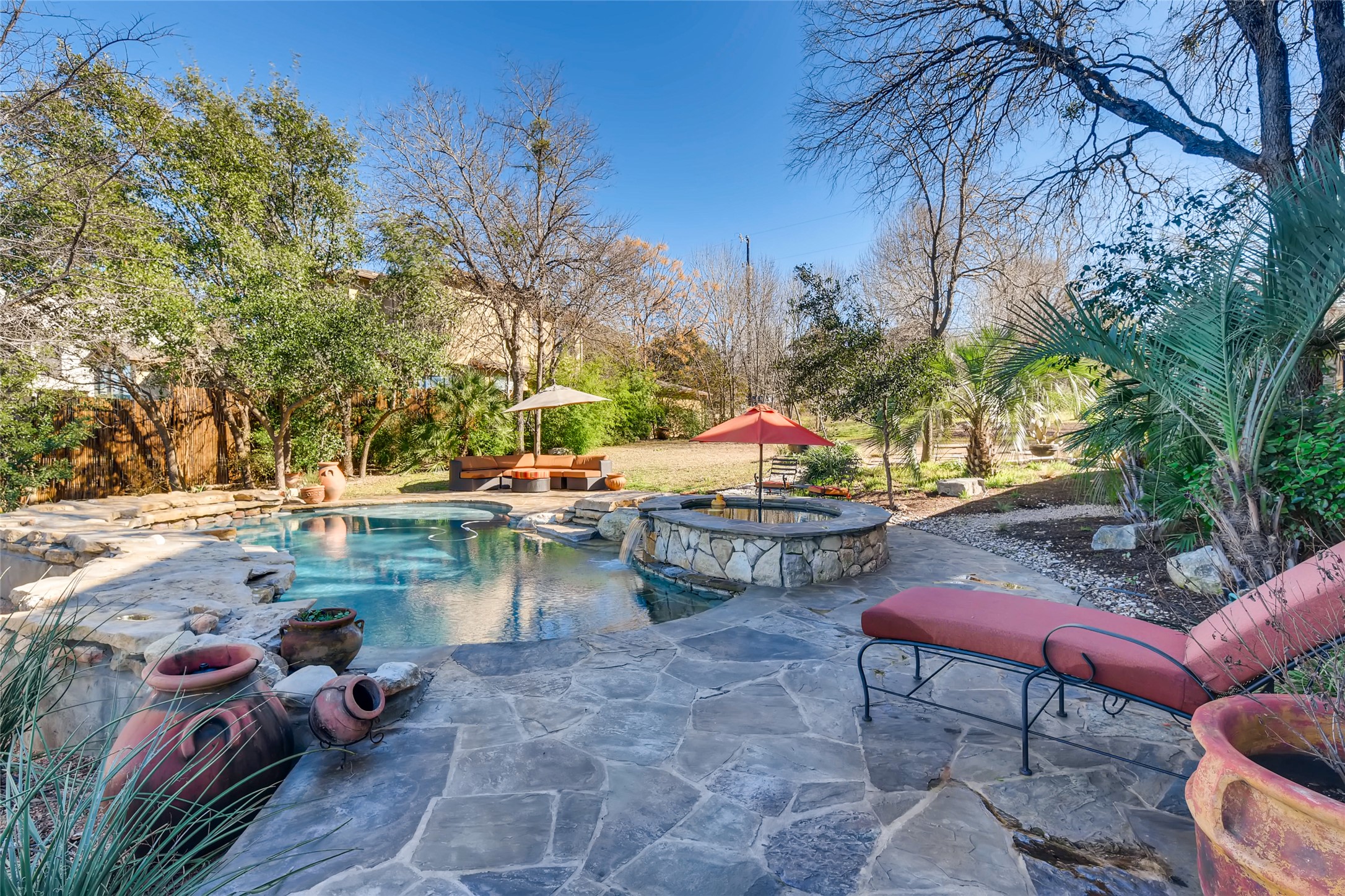 2614 Pace Bend Road South Spicewood, TX 78669 - Photo 3 of 26 Summer is here and this gorgeous pool with waterfall features will provide amazing "staycation"!
