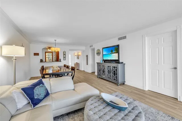 a kitchen with stainless steel appliances granite countertop a stove microwave and cabinets