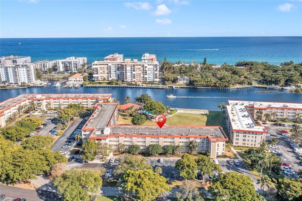 3150 Northeast 48th Court, Unit 204 Lighthouse Point, FL 33064 - Photo 28 of 28 a view of a city with an ocean