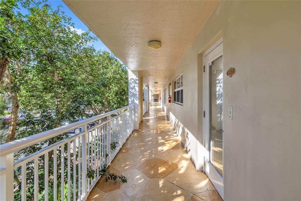 3150 Northeast 48th Court, Unit 204 Lighthouse Point, FL 33064 - Photo 3 of 28 a view of a balcony