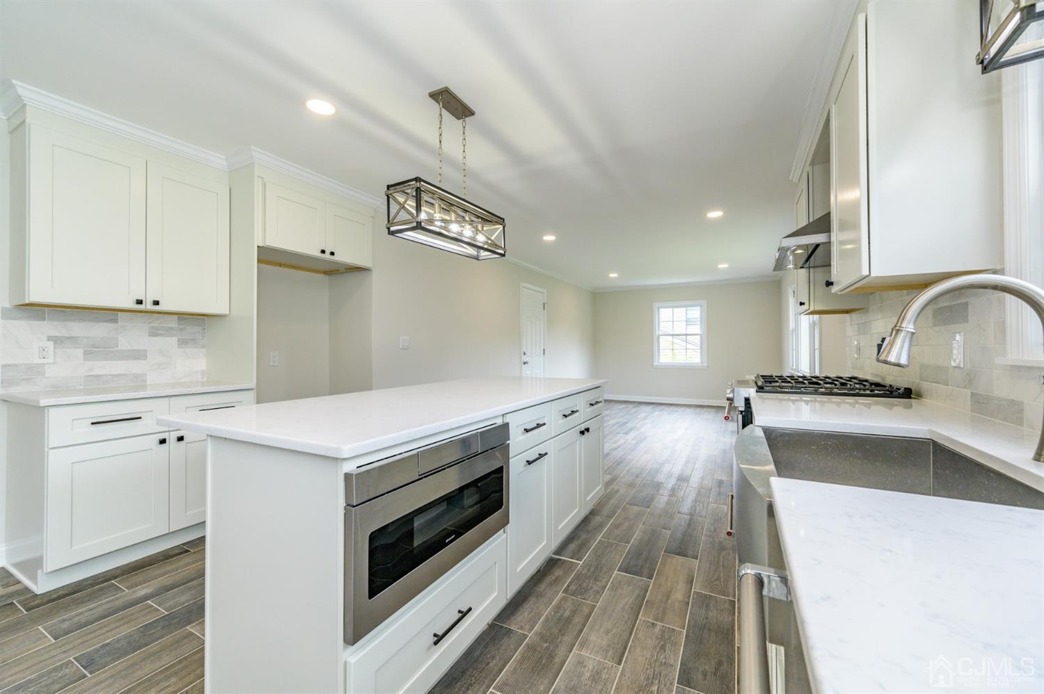 14 Shetland Road Florham Park, NJ 07932 - Photo 15 of 40 a kitchen with a stove a sink and a refrigerator