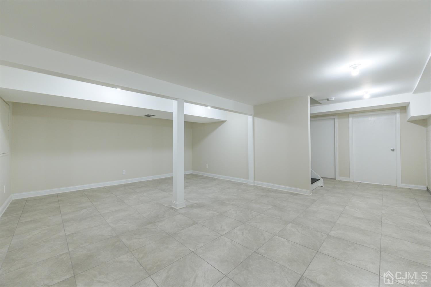 14 Shetland Road Florham Park, NJ 07932 - Photo 31 of 40 an empty room with an entryway