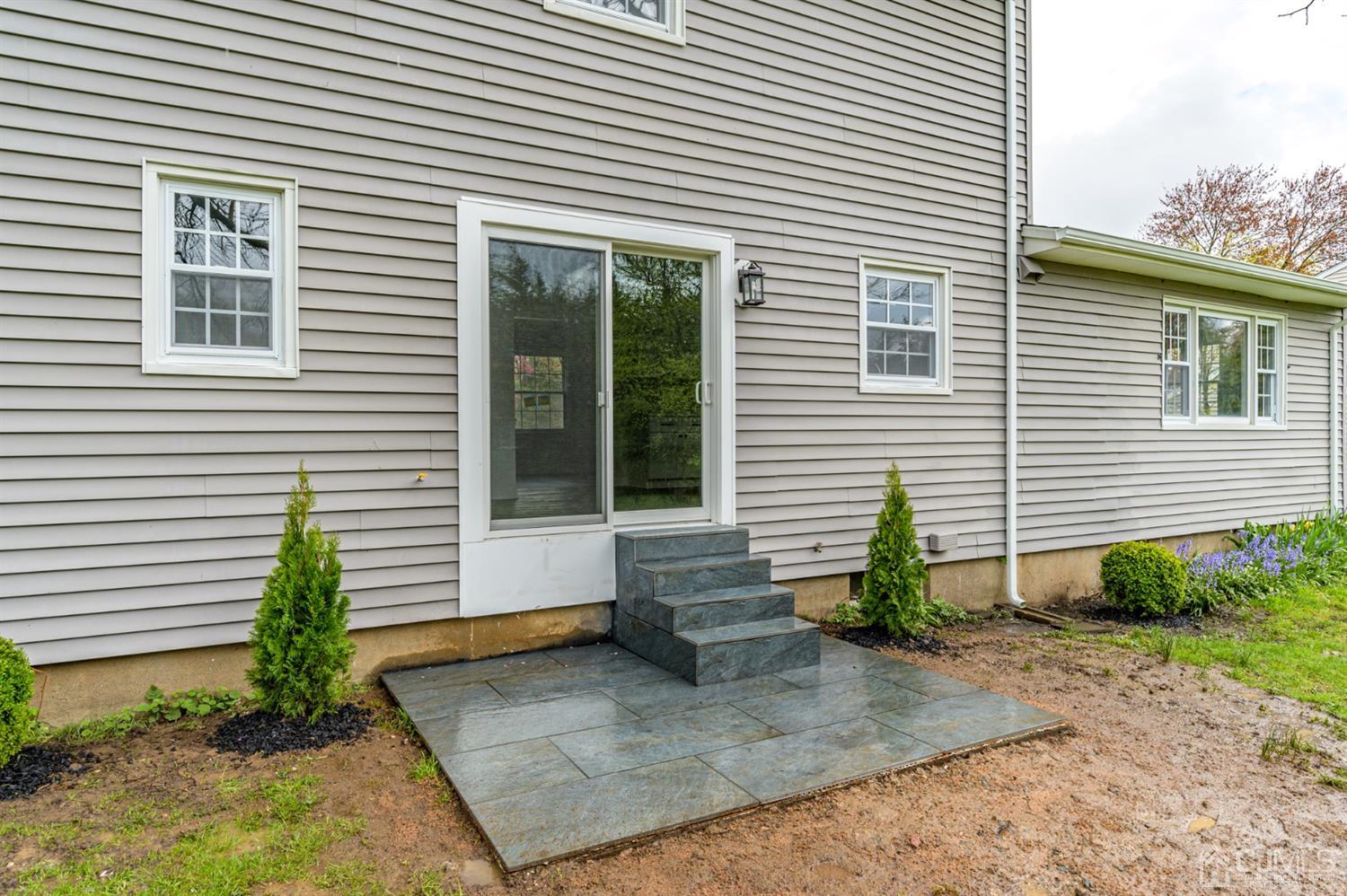 14 Shetland Road Florham Park, NJ 07932 - Photo 36 of 40 a view of a house with a yard and a large window