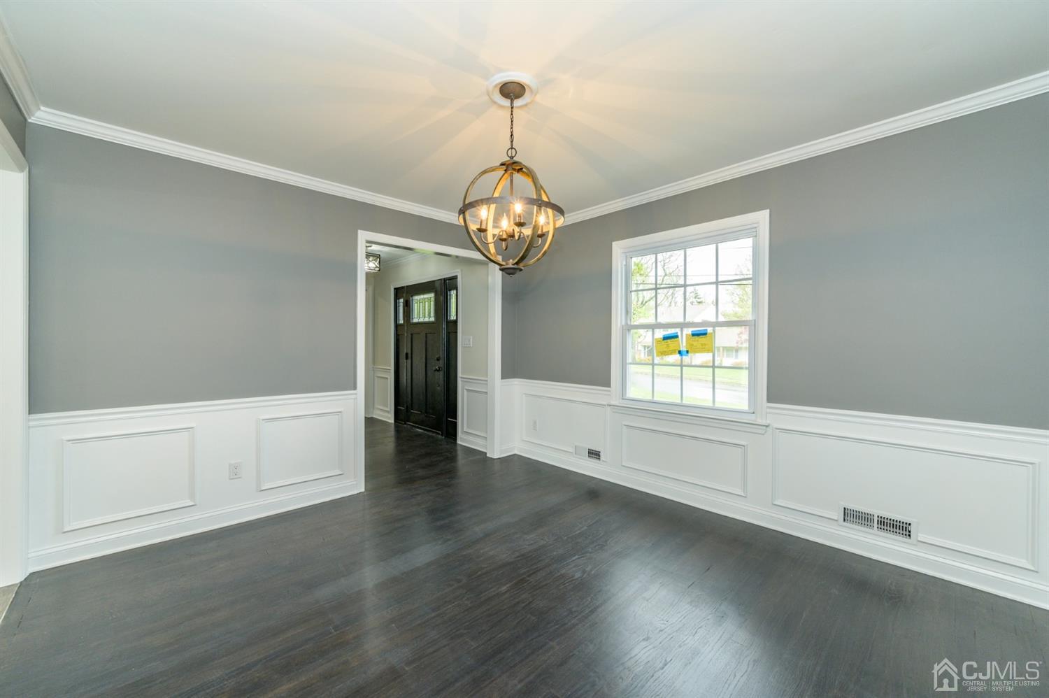 14 Shetland Road Florham Park, NJ 07932 - Photo 8 of 40 a view of an empty room with window and wooden floor
