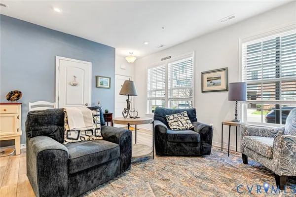 a living room with furniture and a couch