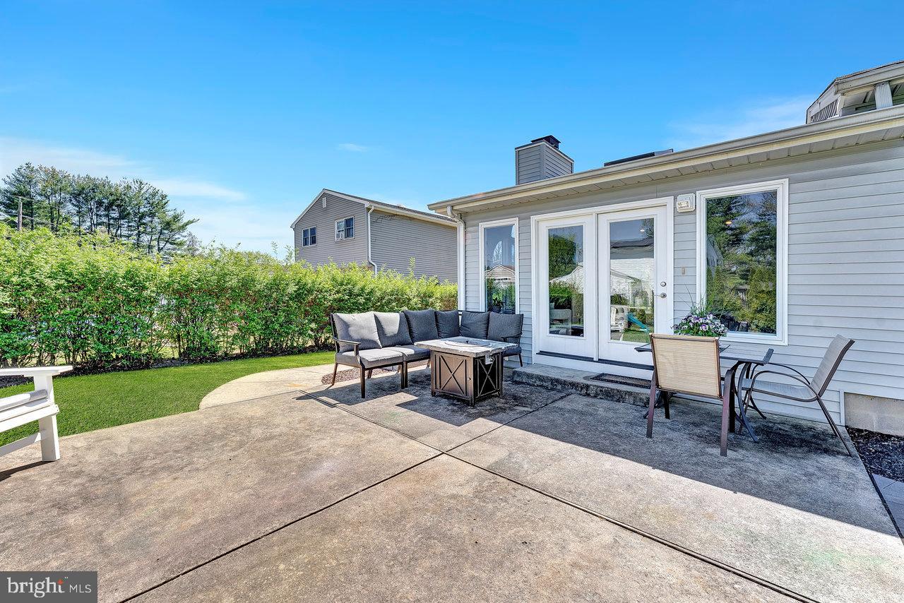20 Wolfpack Road Hamilton, NJ 08619 - Photo 21 of 25 a view of a house with backyard sitting area and garden