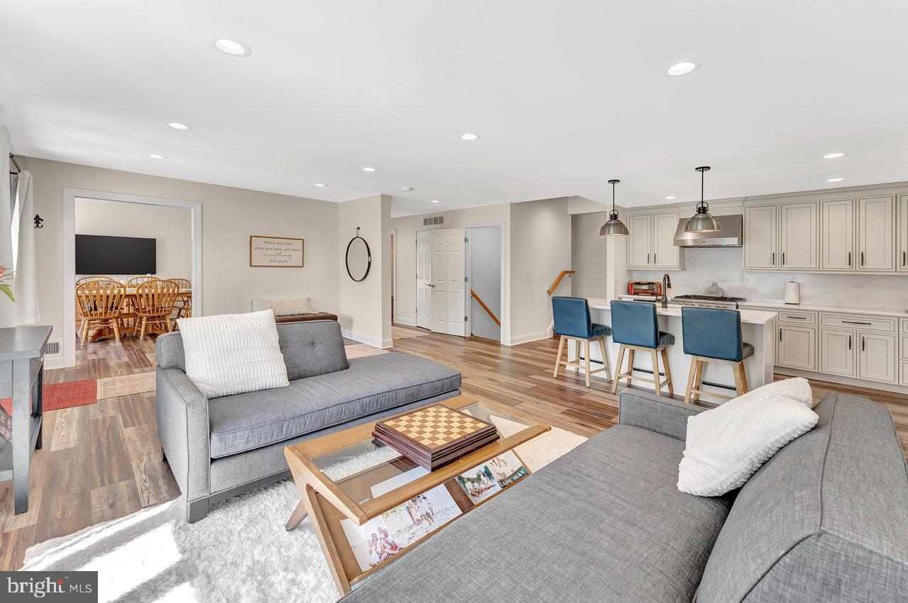 20 Wolfpack Road Hamilton, NJ 08619 - Photo 3 of 25 a living room with furniture and kitchen view