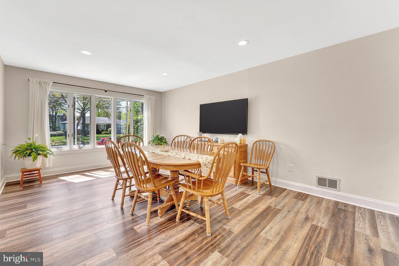 20 Wolfpack Road Hamilton, NJ 08619 - Photo 10 of 25 a view of a dining room with furniture window and wooden floor