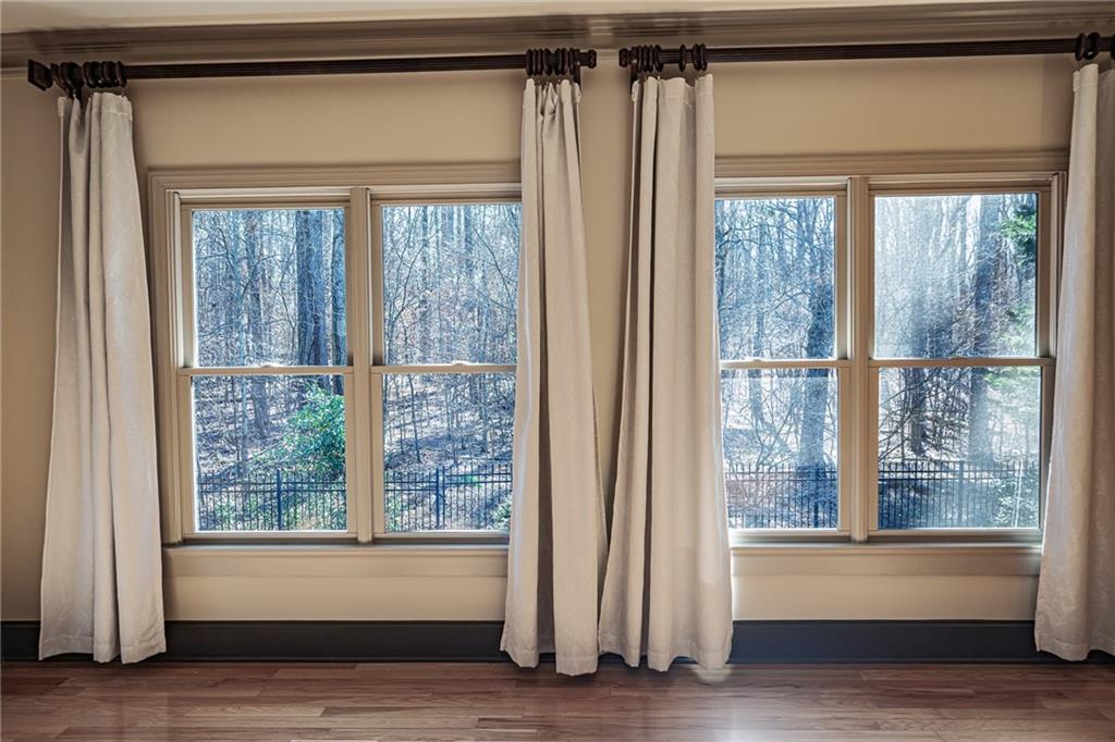 1103 Ridenour Court Northwest Kennesaw, GA 30152 - Photo 23 of 56 a view of a small space with wooden floor and a window