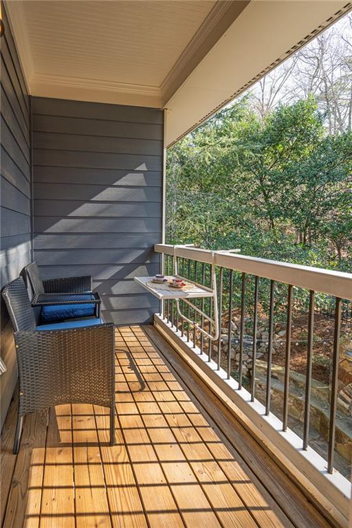 1103 Ridenour Court Northwest Kennesaw, GA 30152 - Photo 25 of 56 a view of balcony with wooden floor