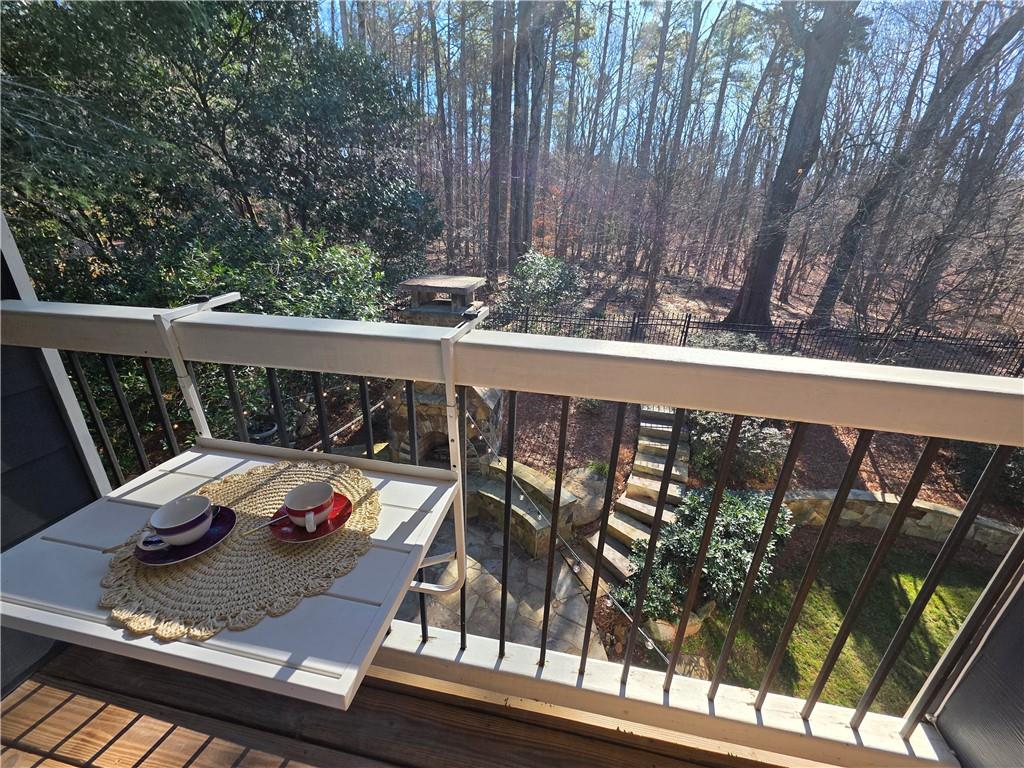1103 Ridenour Court Northwest Kennesaw, GA 30152 - Photo 27 of 56 a view of deck with furniture and wooden floor