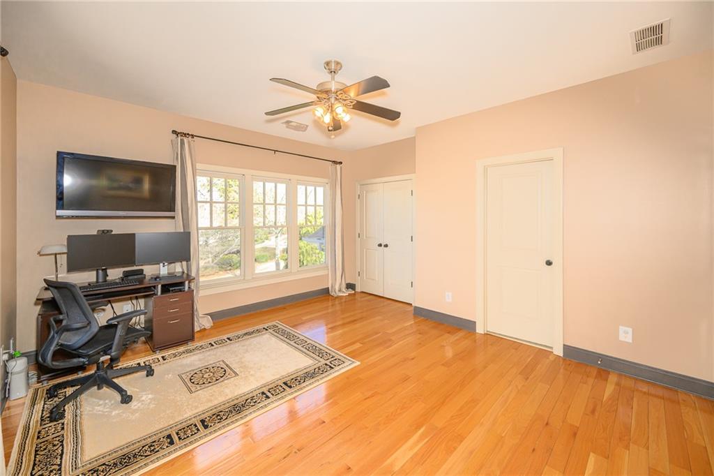 1103 Ridenour Court Northwest Kennesaw, GA 30152 - Photo 33 of 56 a view of a workspace with furniture and a window
