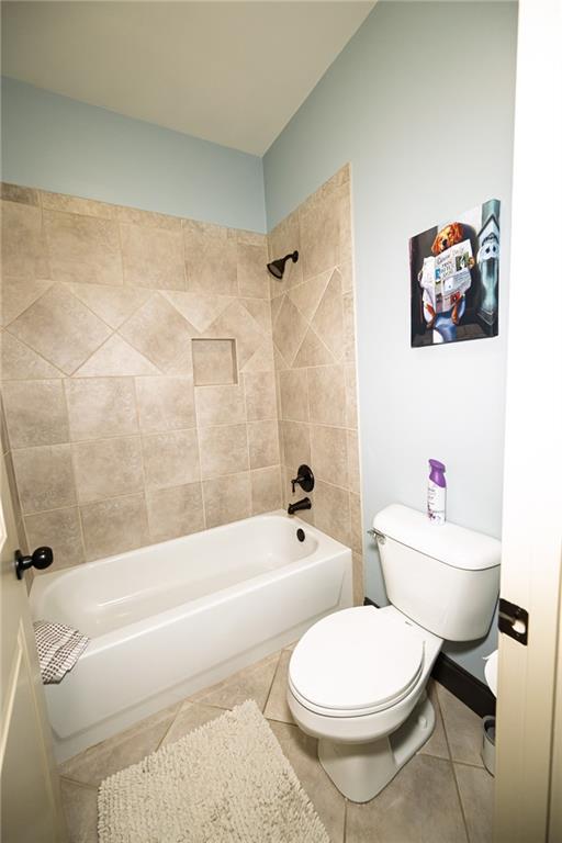 1103 Ridenour Court Northwest Kennesaw, GA 30152 - Photo 36 of 56 a bathroom with a toilet and a bath tub