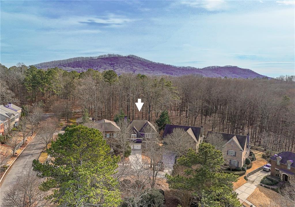 1103 Ridenour Court Northwest Kennesaw, GA 30152 - Photo 53 of 56 a view of a town with mountains in the background