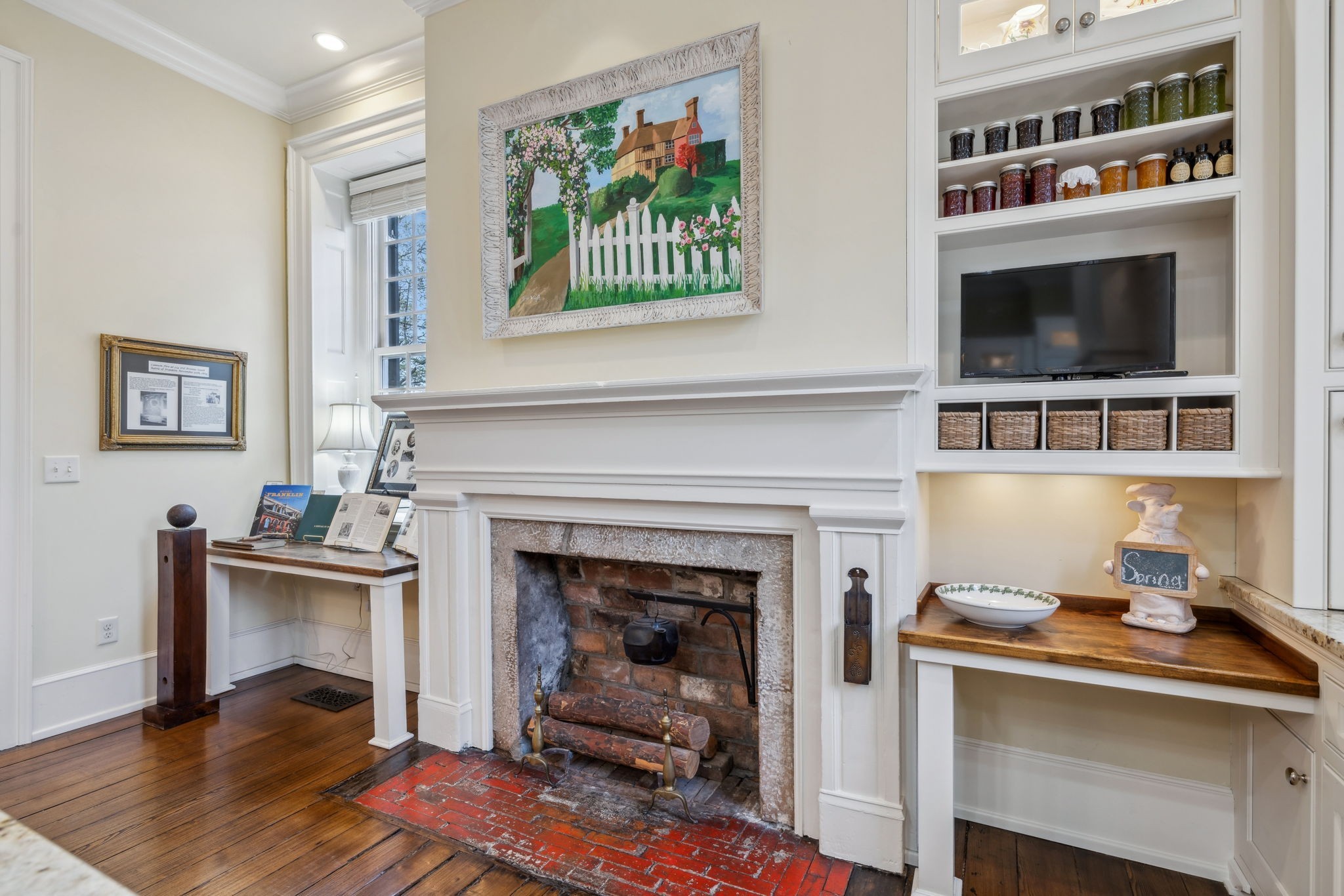 224 3rd Avenue South Franklin, TN 37064 - Photo 40 of 92 a living room with furniture and a fireplace