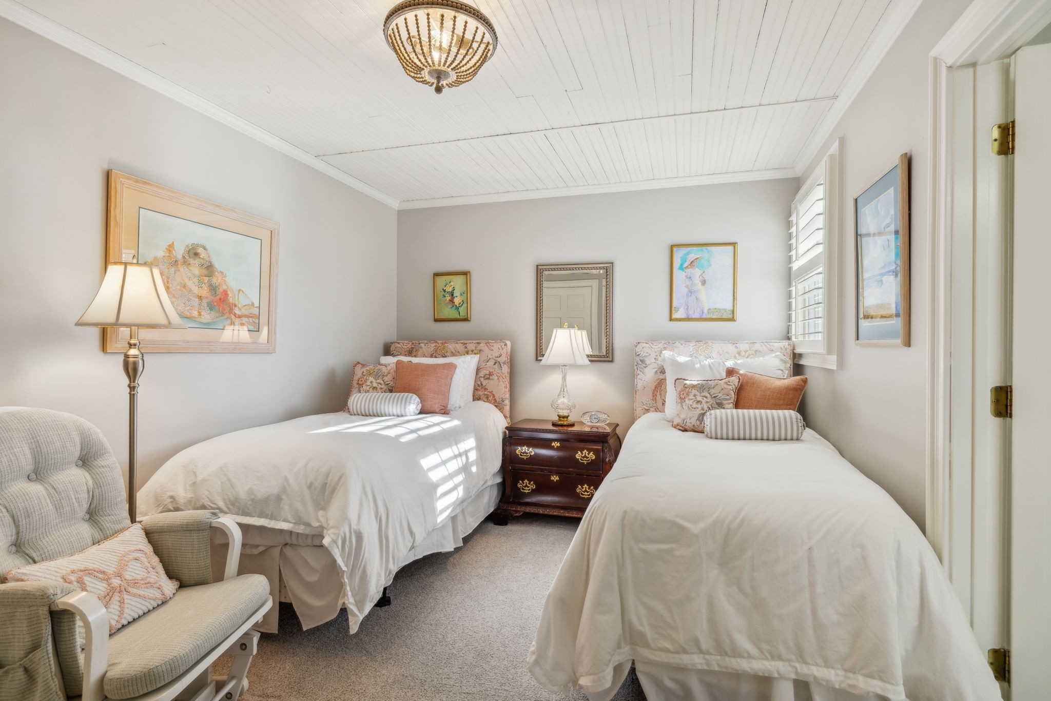 224 3rd Avenue South Franklin, TN 37064 - Photo 80 of 92 a bedroom with bed and a chandelier