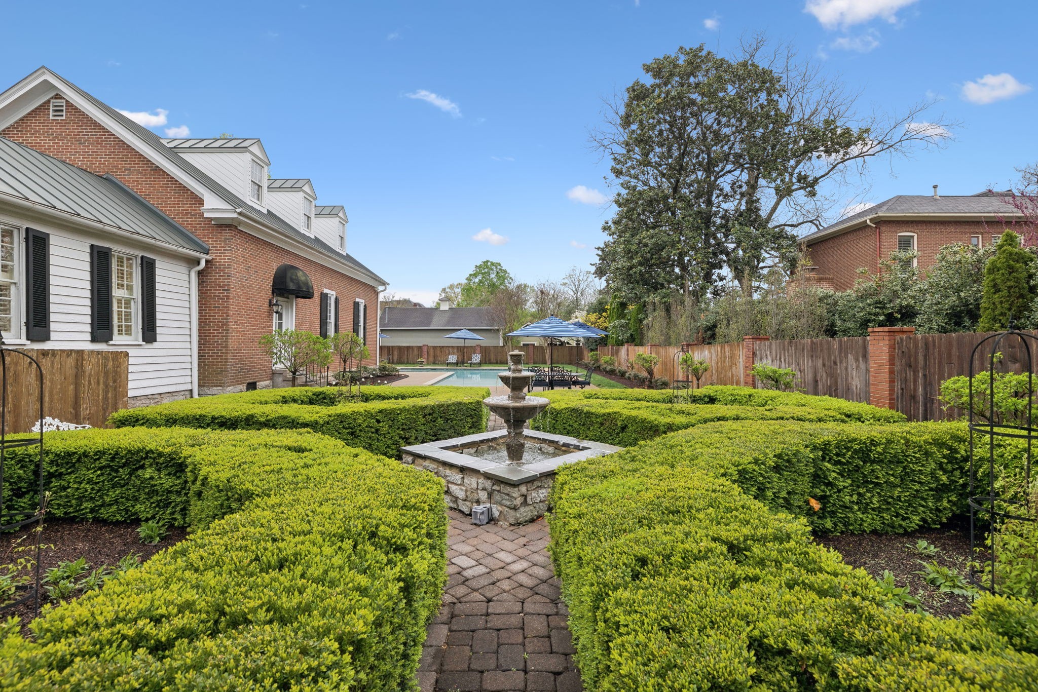 224 3rd Avenue South Franklin, TN 37064 - Photo 82 of 92 a view of a house with backyard and sitting area