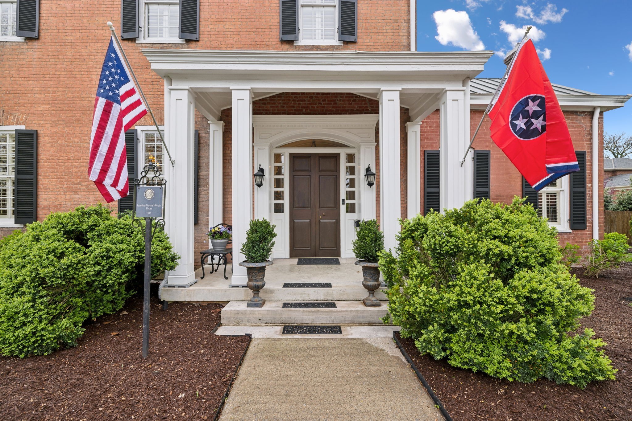 224 3rd Avenue South Franklin, TN 37064 - Photo 87 of 92 a front view of a house with garden