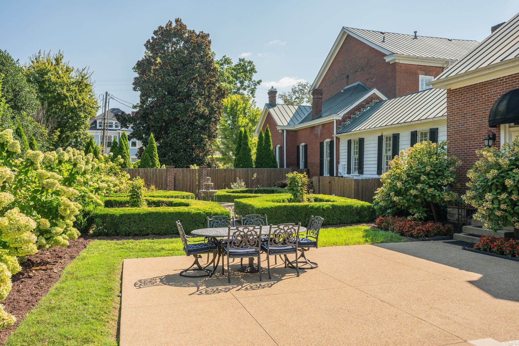 224 3rd Avenue South Franklin, TN 37064 - Photo 92 of 92 a view of a house with a swimming pool and a yard