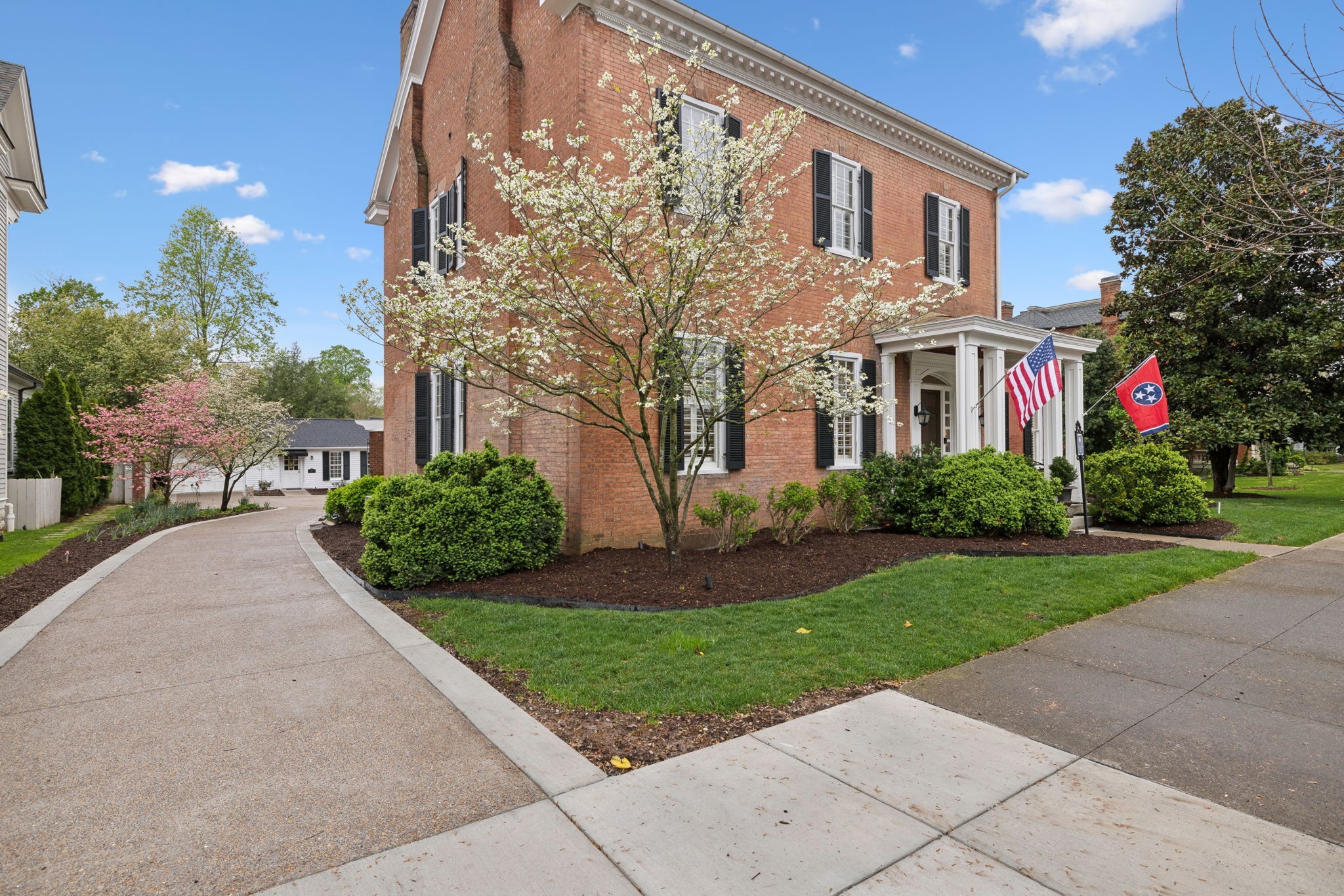 224 3rd Avenue South Franklin, TN 37064 - Photo 10 of 92 a front view of a house with garden