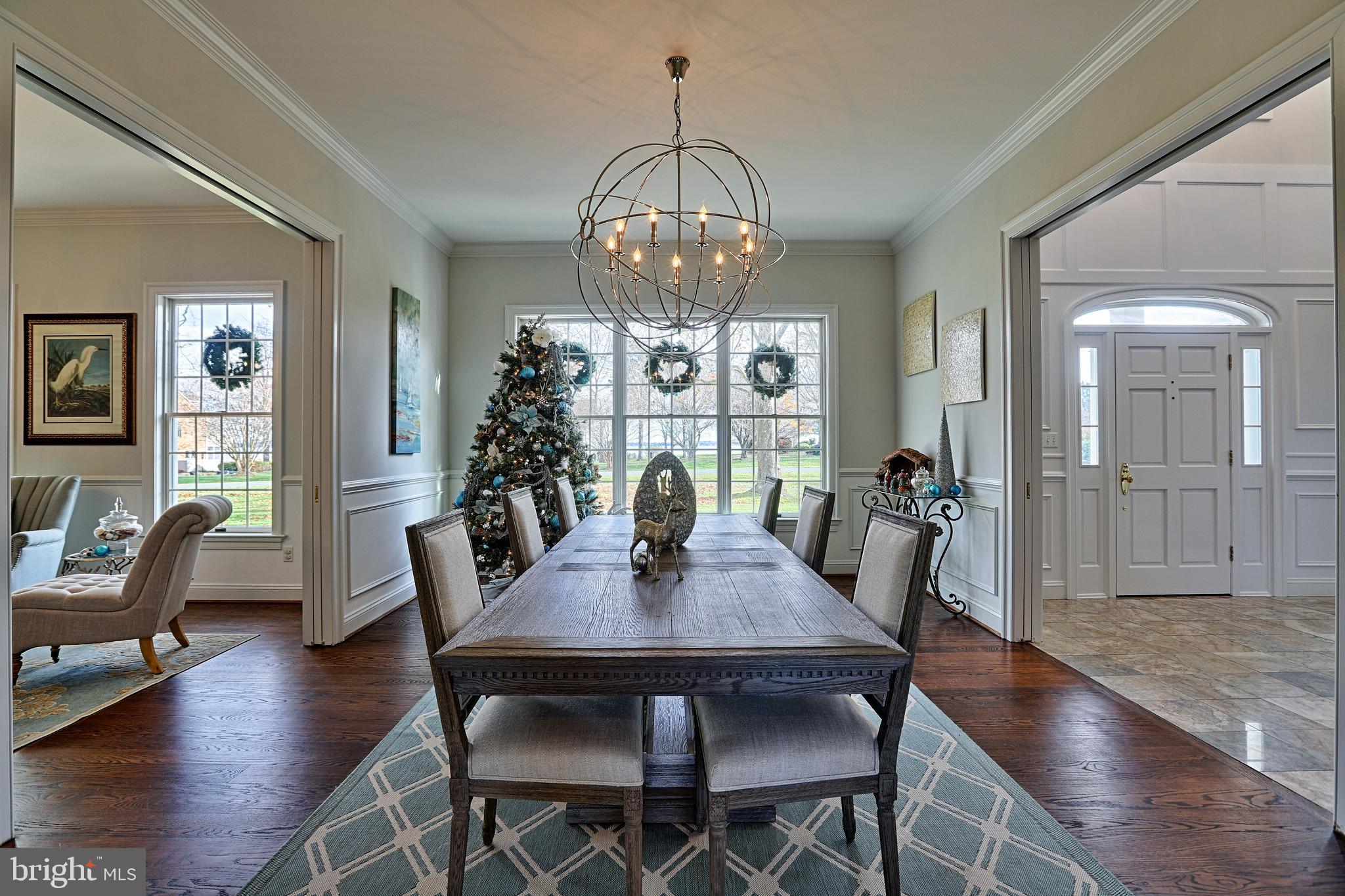 2902 Cox Neck Road East Chester, MD 21619 - Photo 4 of 57 a view of a dining room with furniture window and wooden floor