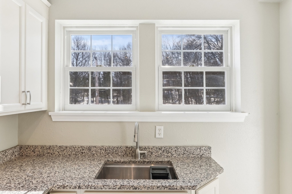 27 Elm Road, Unit D Devens, MA 01434 - Photo 12 of 31 a kitchen with a sink and a window