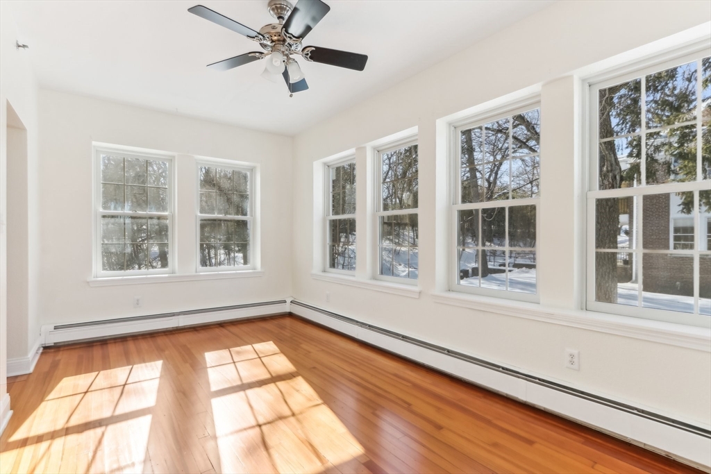 27 Elm Road, Unit D Devens, MA 01434 - Photo 16 of 31 an empty room with wooden floor and windows