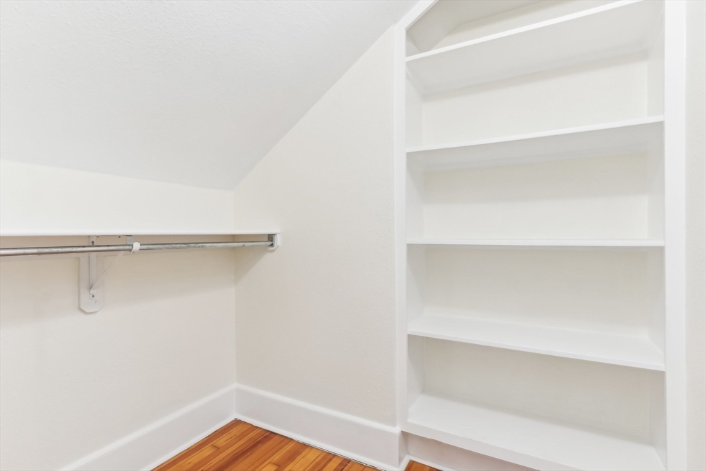 27 Elm Road, Unit D Devens, MA 01434 - Photo 19 of 31 a view of walk in closet with empty racks