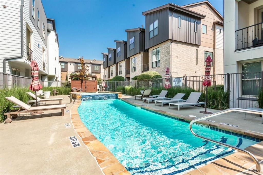 a view of a house with swimming pool patio and sitting area