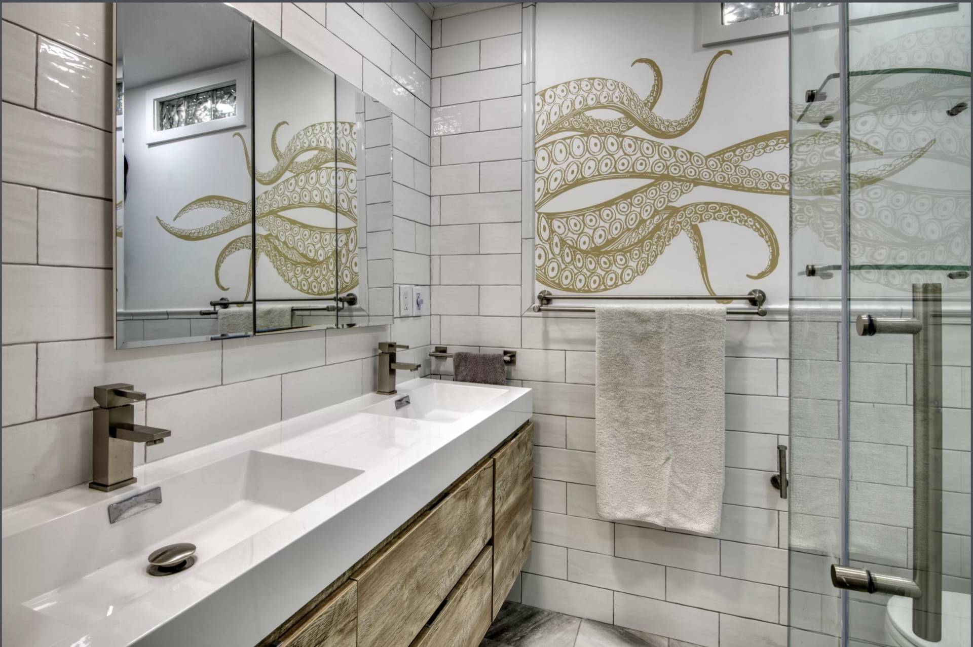 Undisclosed Address Montauk, NY 11954 - Photo 5 of 10 a bathroom with a sink and a mirror