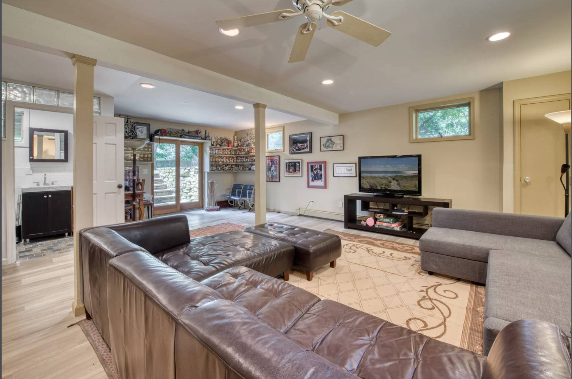 Undisclosed Address Montauk, NY 11954 - Photo 9 of 10 a living room with furniture and a flat screen tv