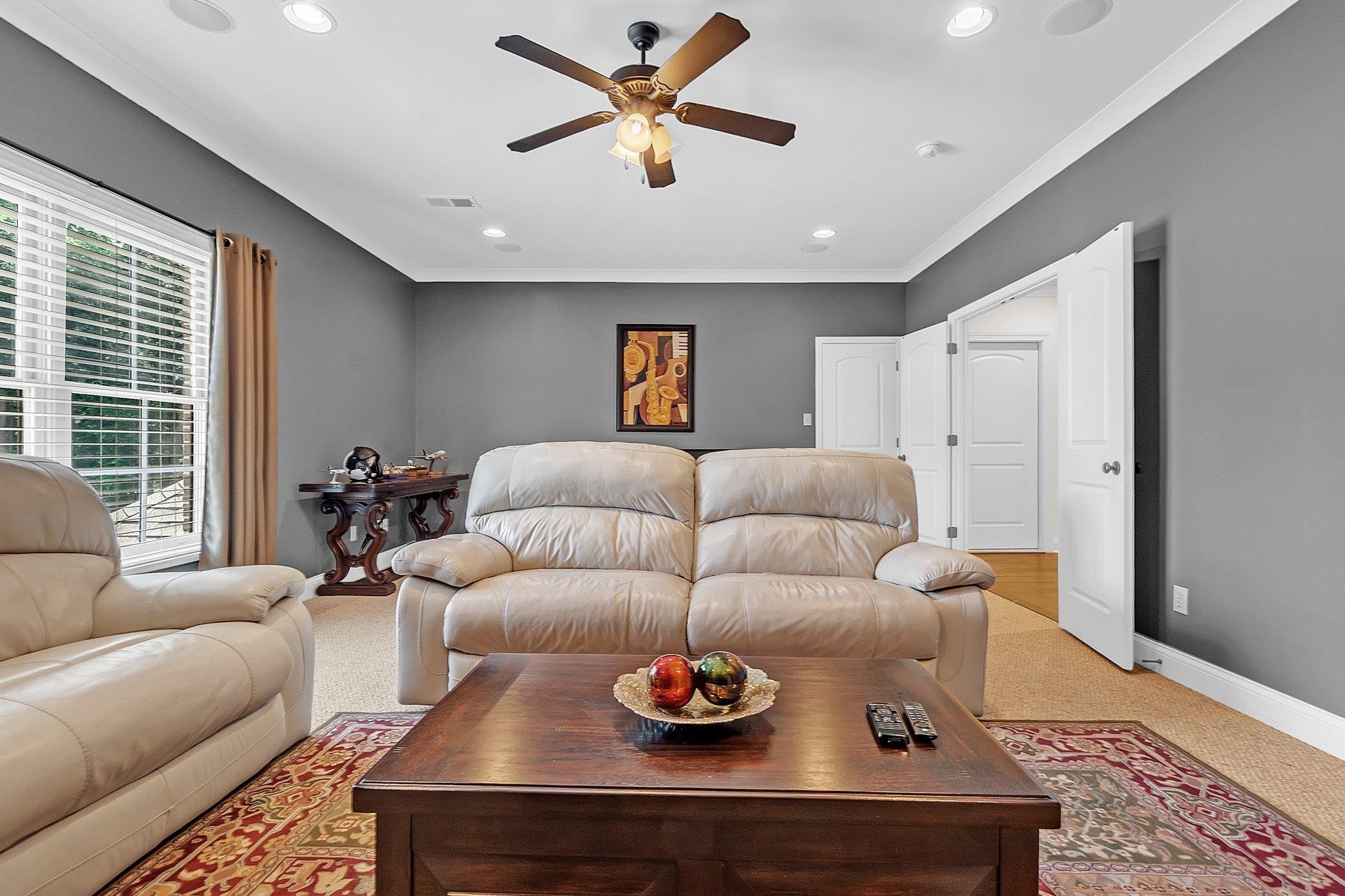 3246 North Hartwell Ridge Drive Collierville, TN 38017 - Photo 33 of 40 Spacious room with gray walls and white crown molding