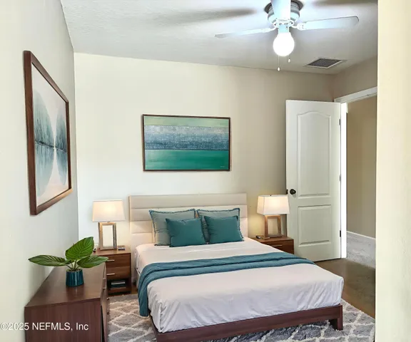 a workspace with furniture and a flat screen tv