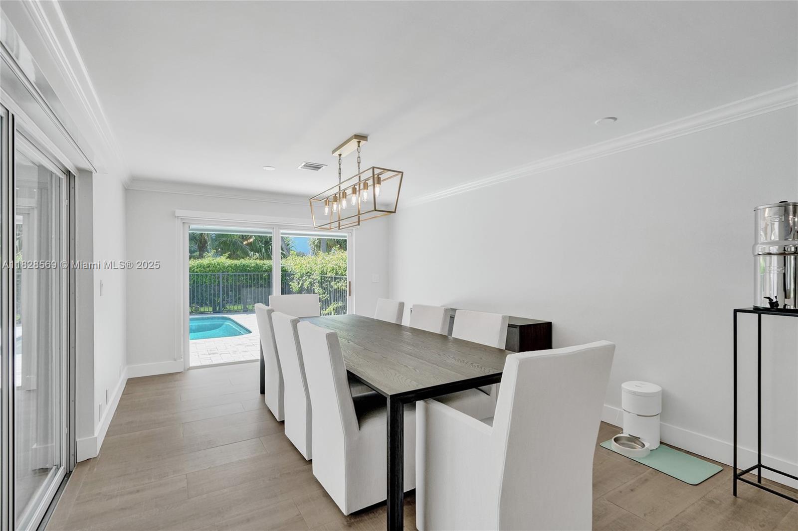 5854 Pinebrook Drive Boca Raton, FL 33433 - Photo 21 of 76 a view of a dining room with furniture window and outside view