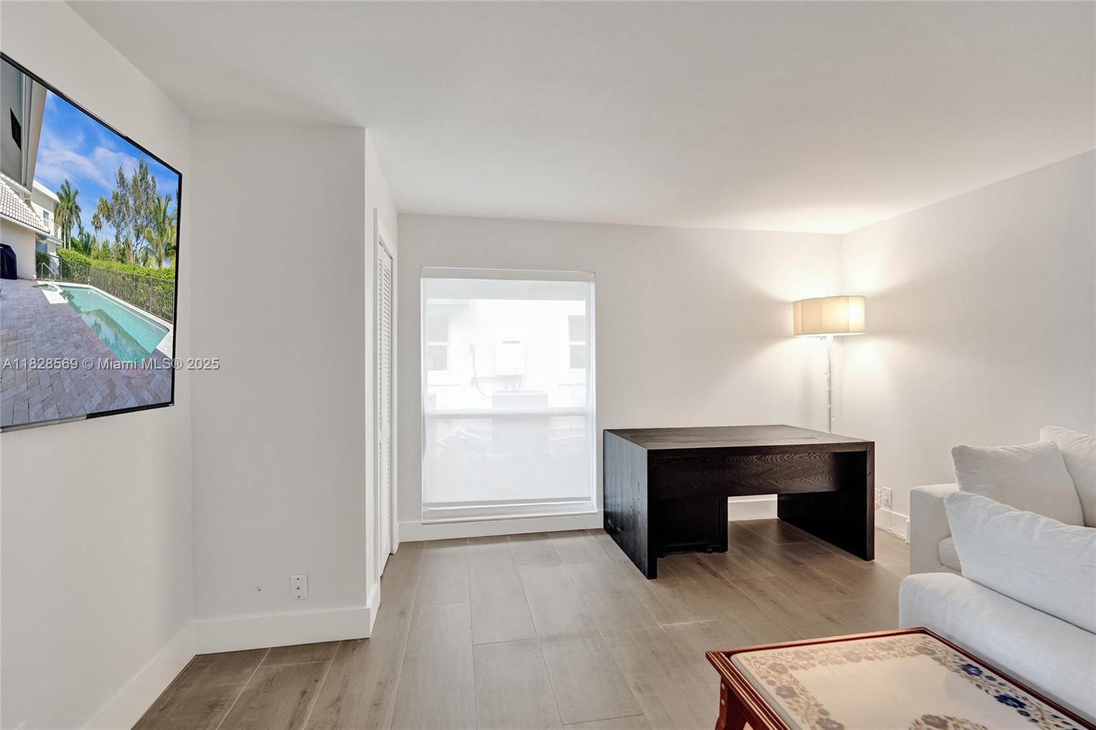 5854 Pinebrook Drive Boca Raton, FL 33433 - Photo 34 of 76 a view of room with furniture and a window