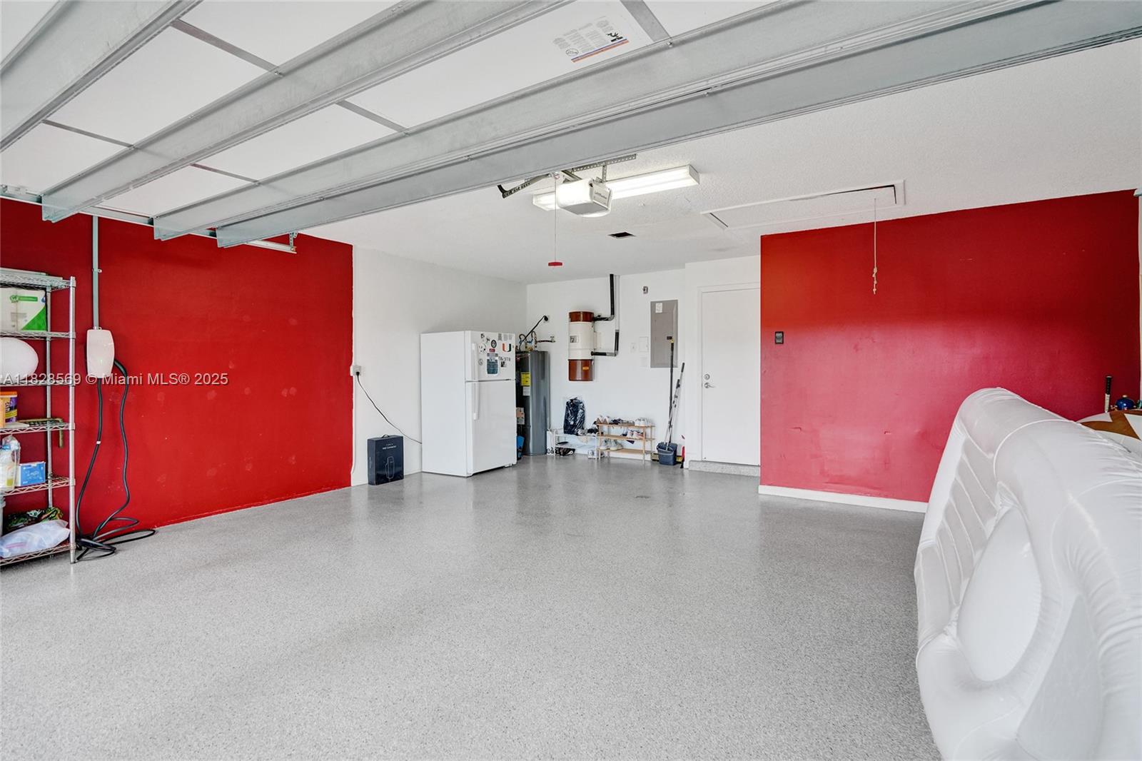 5854 Pinebrook Drive Boca Raton, FL 33433 - Photo 57 of 76 Immaculate clean and bright 2 car garage with Testla Charger