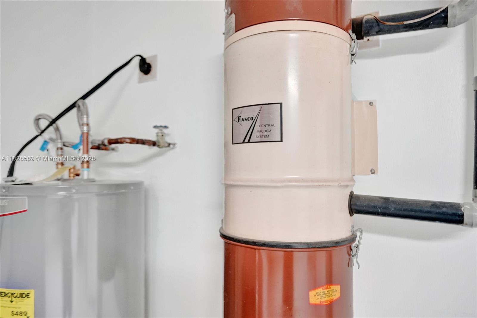 5854 Pinebrook Drive Boca Raton, FL 33433 - Photo 58 of 76 Central vacuum system.